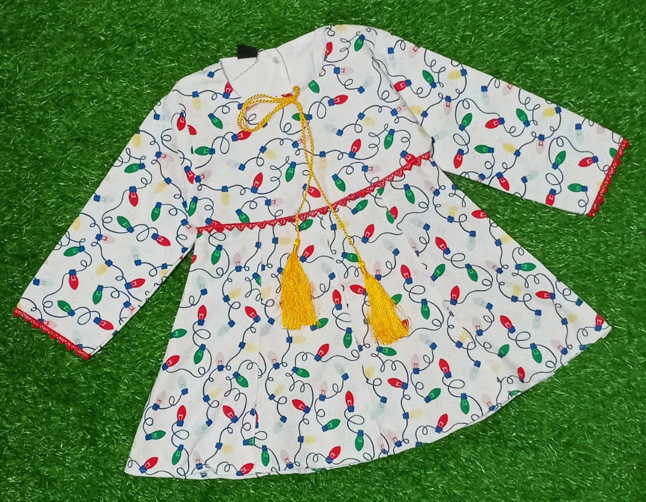 Girls White Printed Frock | Colorful Light Bulb Design Dress with Yellow Tassels
