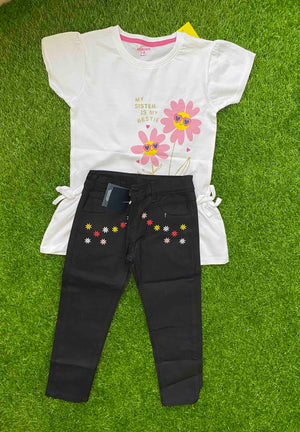 Daisy Delight - White Shirt paired with Black Jeans