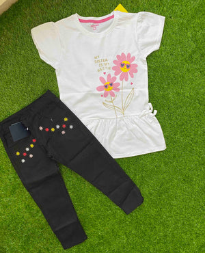 Daisy Delight - White Shirt paired with Black Jeans